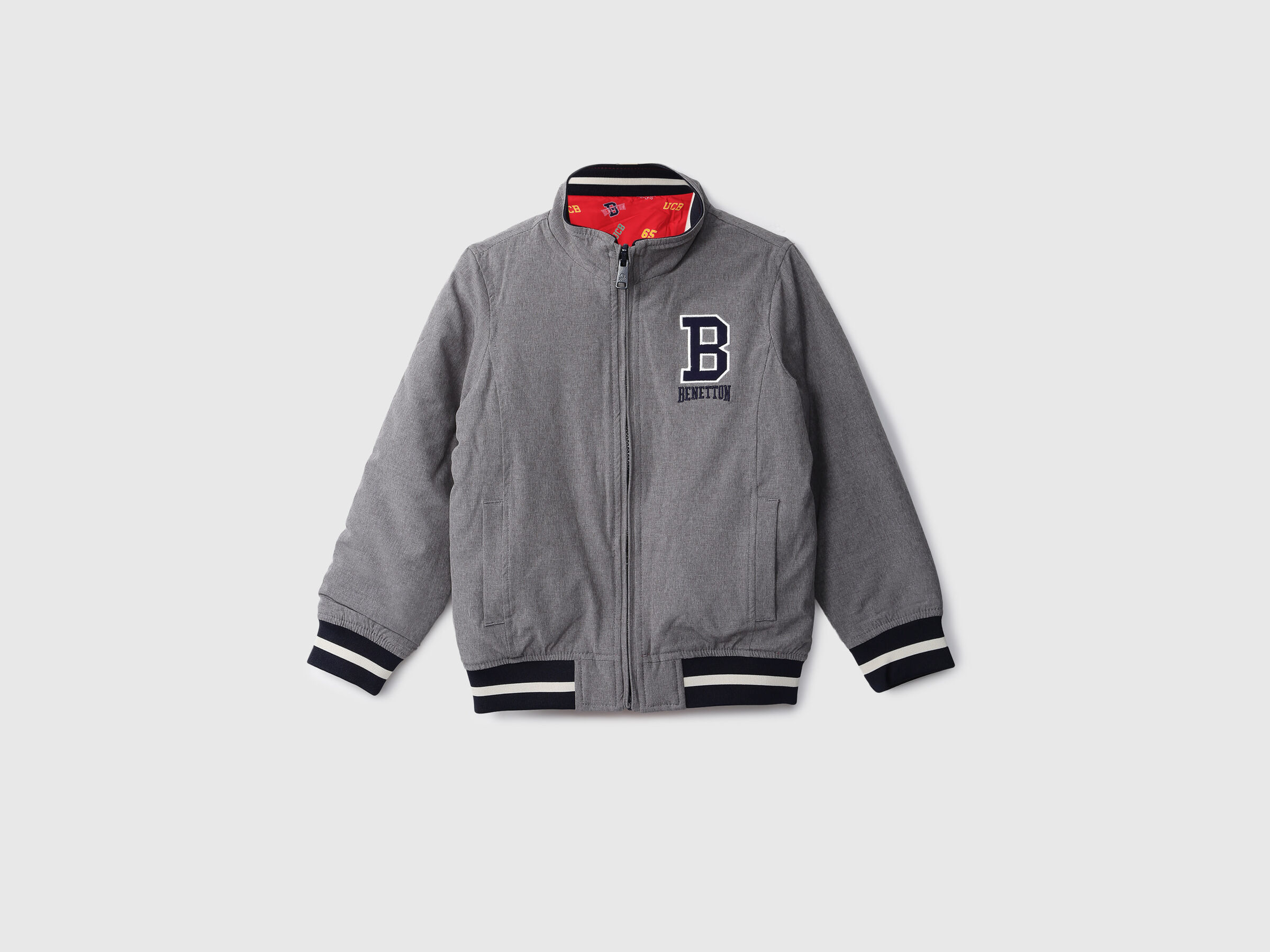 REVERSIBLE JACKET WITH AOP AND BADGE image number 0