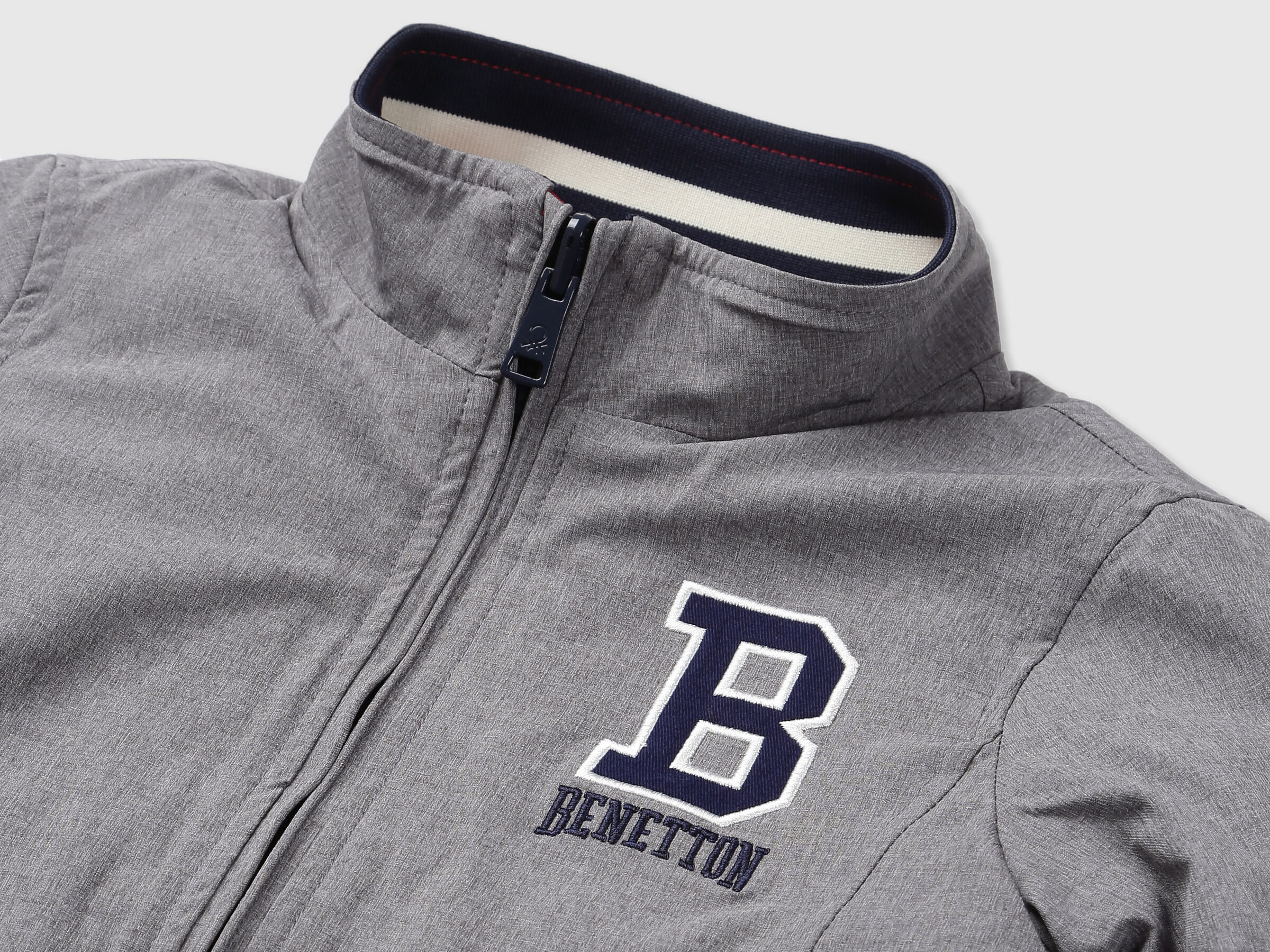 REVERSIBLE JACKET WITH AOP AND BADGE image number 2