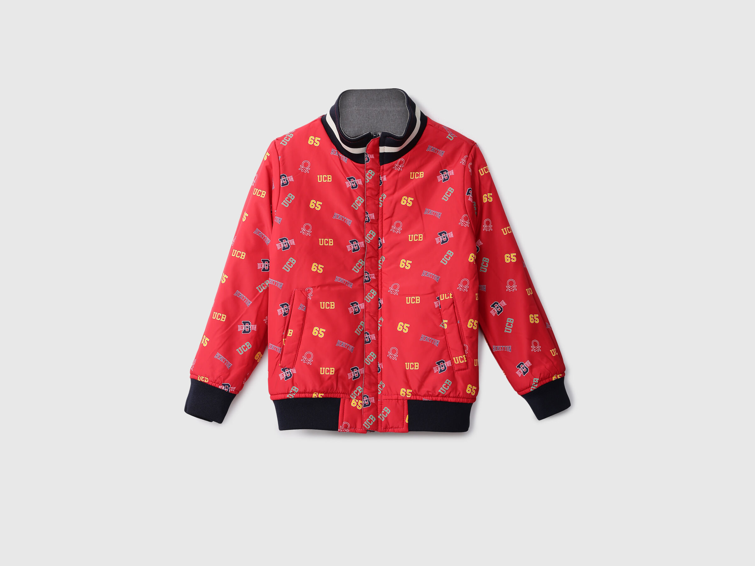 REVERSIBLE JACKET WITH AOP AND BADGE image number 1