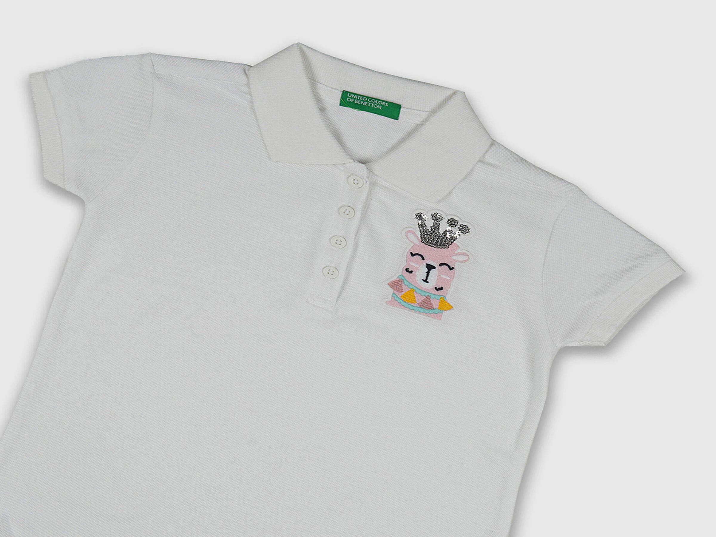 Solid Polo With Llama Badge image number 2