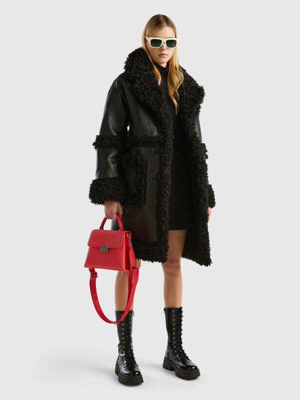 Coat in imitation leather with faux fur Women