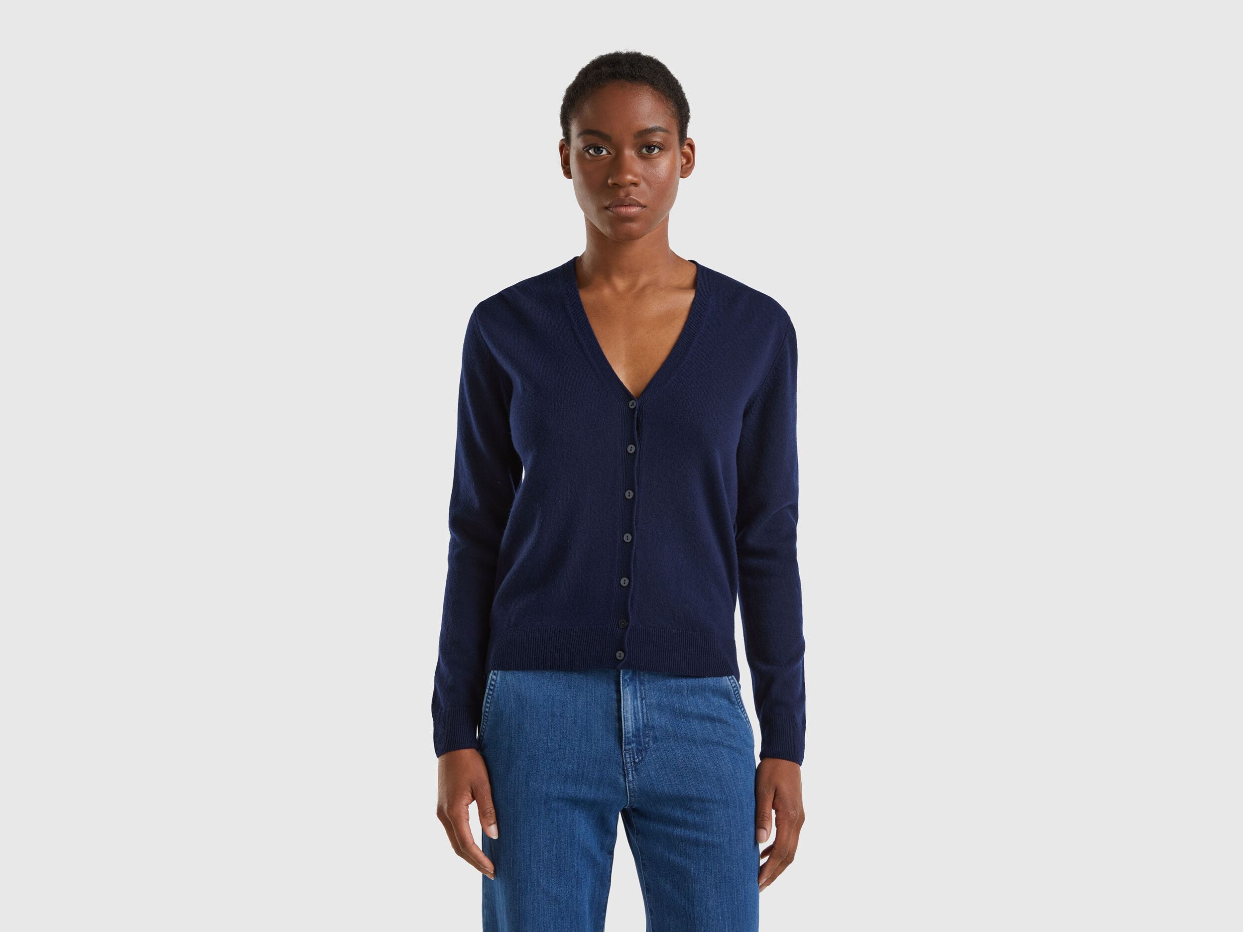 Dark blue V neck cardigan in pure Merino wool