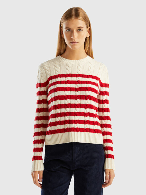 Striped sweater with cables