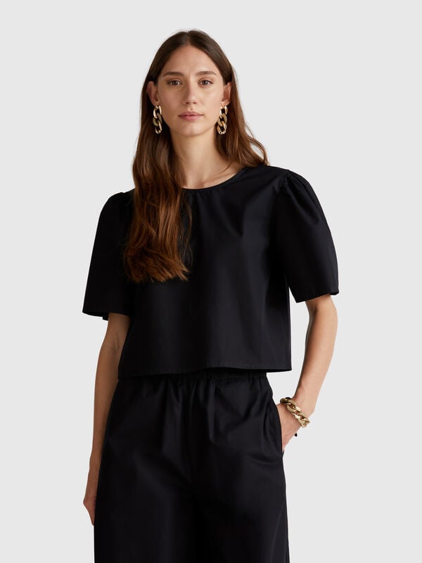 Flared blouse with ruffled sleeves Women