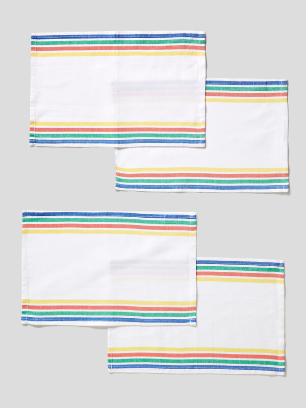 Four placemats with multicolor stripes