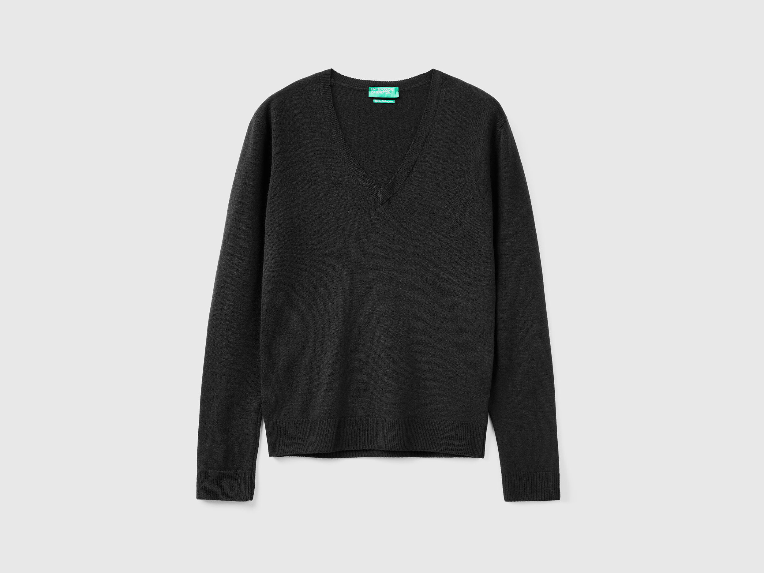 Black V neck sweater in pure Merino wool Black Benetton