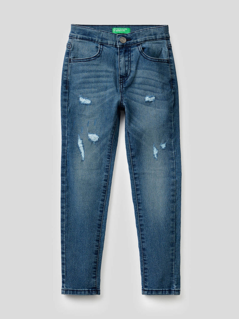 Worn look skinny jeans image number 1