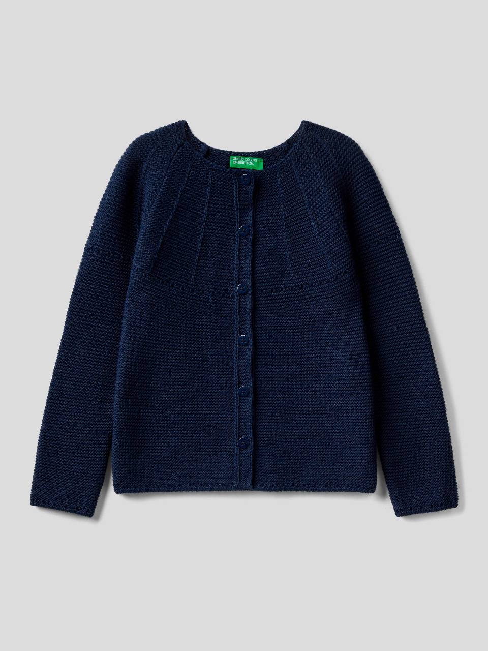 Benetton Cardigan with perforated details. 1