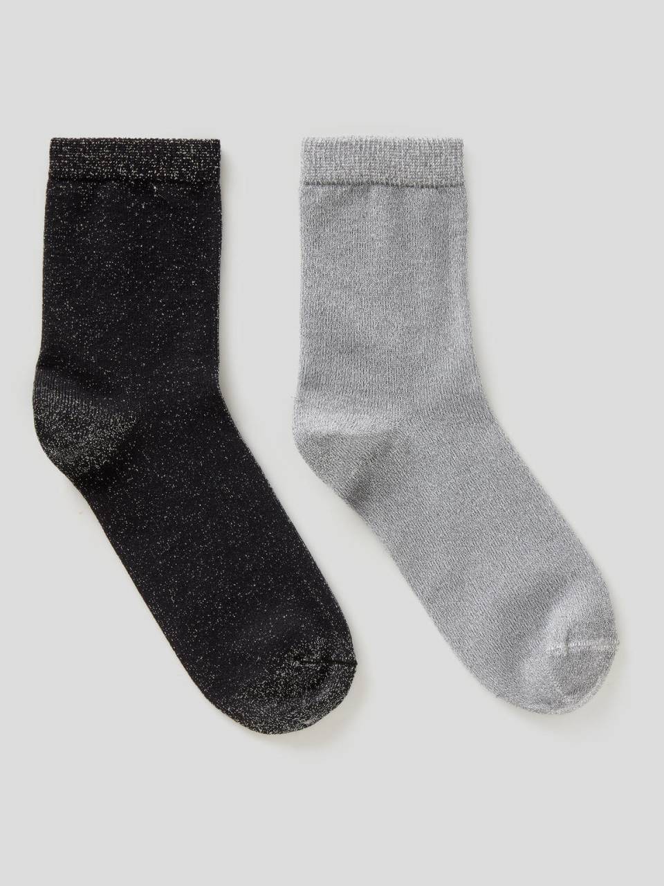 Benetton Two pairs of socks with lurex thread. 1